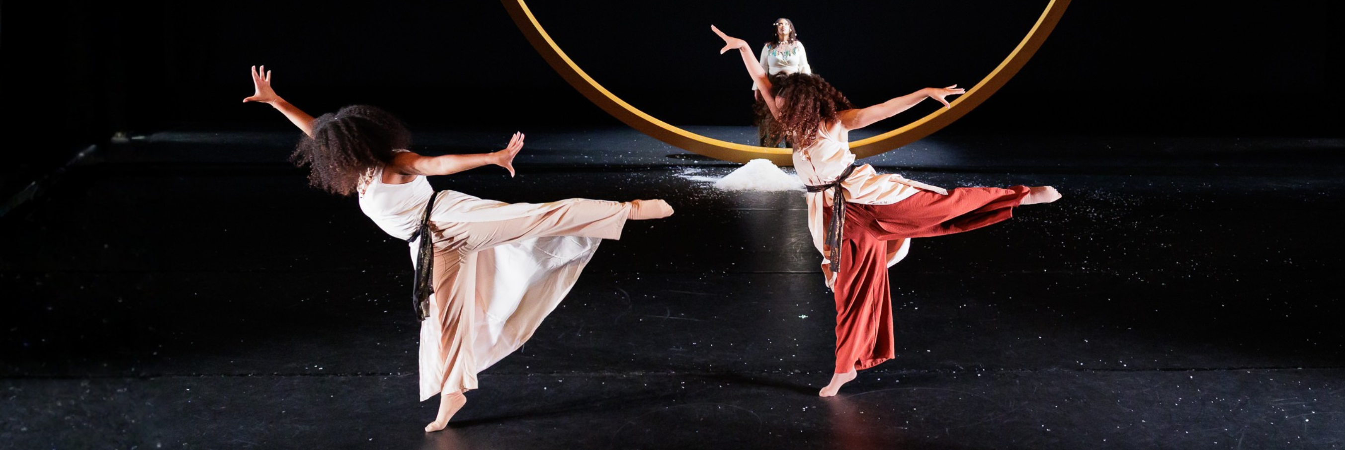 Dancers in arabesque